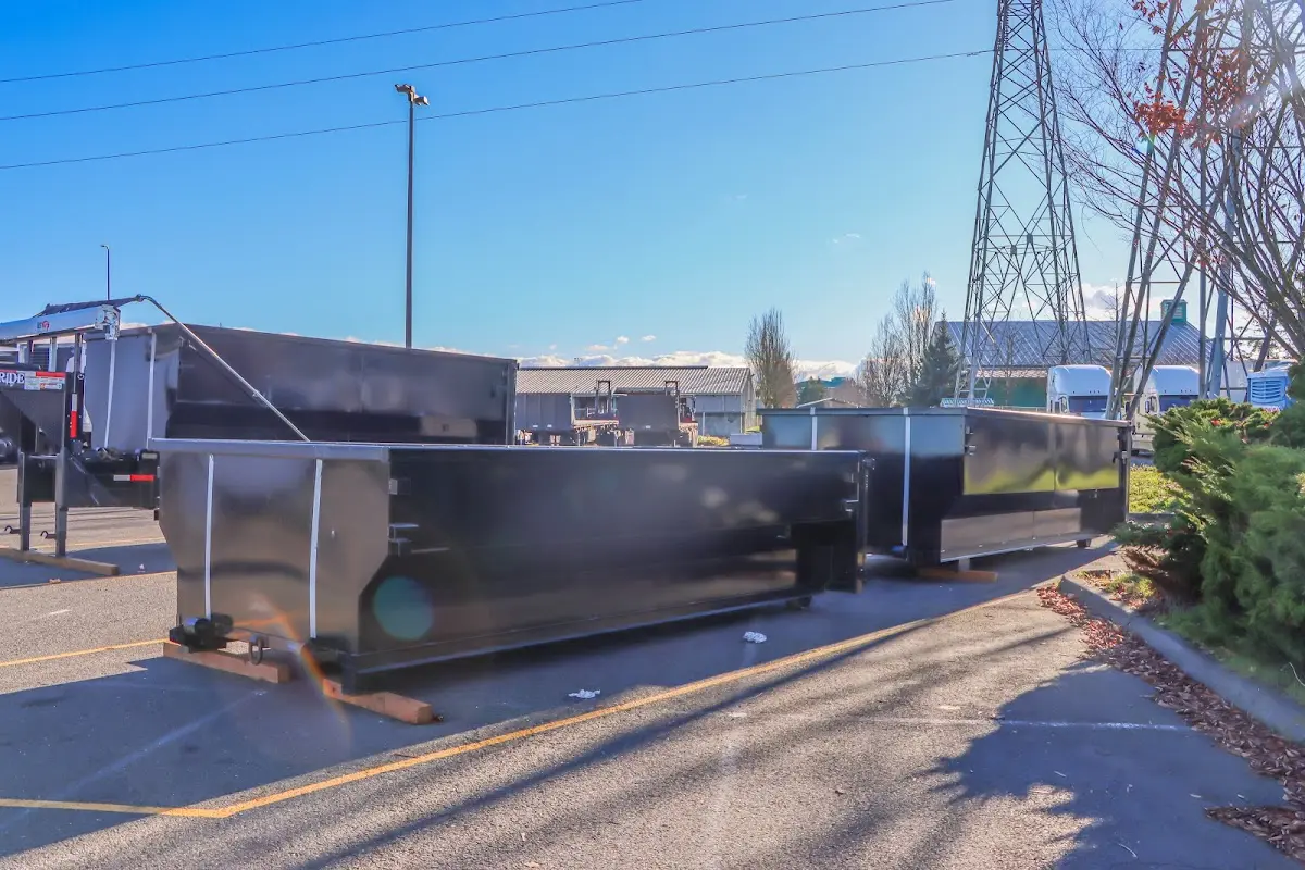 Roll-off dumpster ready for waste disposal at job site for Concrete Dumpster Rental in Scenic Oaks